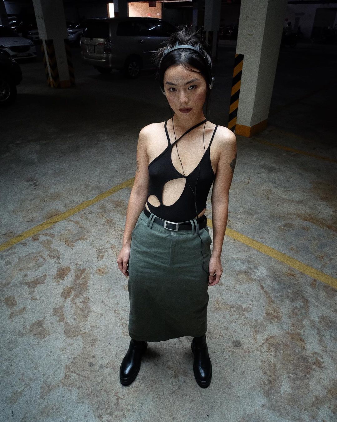 The bodysuit has become even bolder with improvised cut-outs.